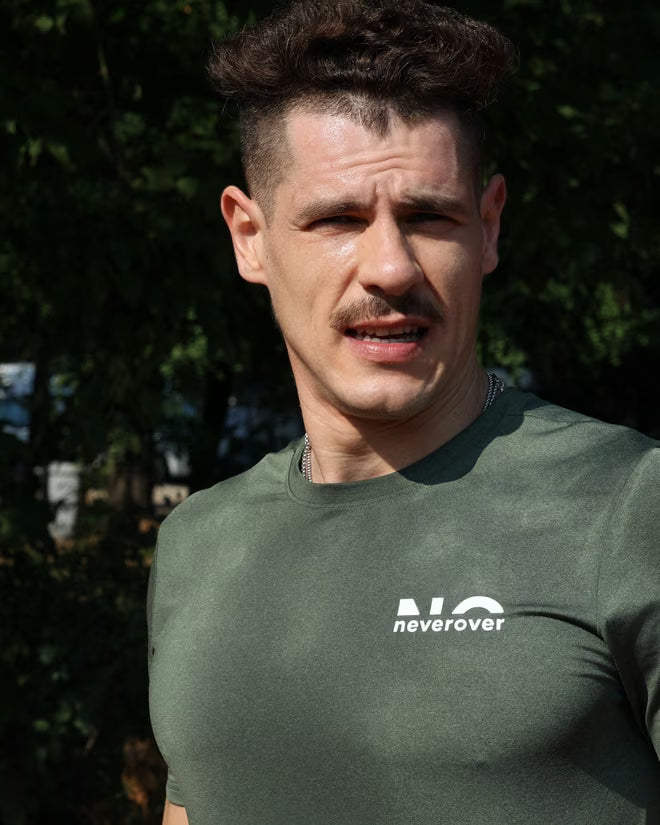 Neverover athlete in the park in the essentials tee