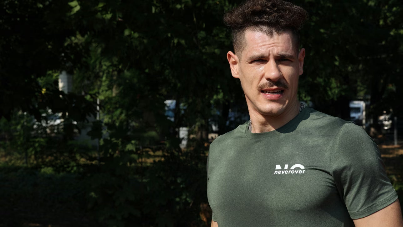 Neverover athlete in the park in the essentials tee