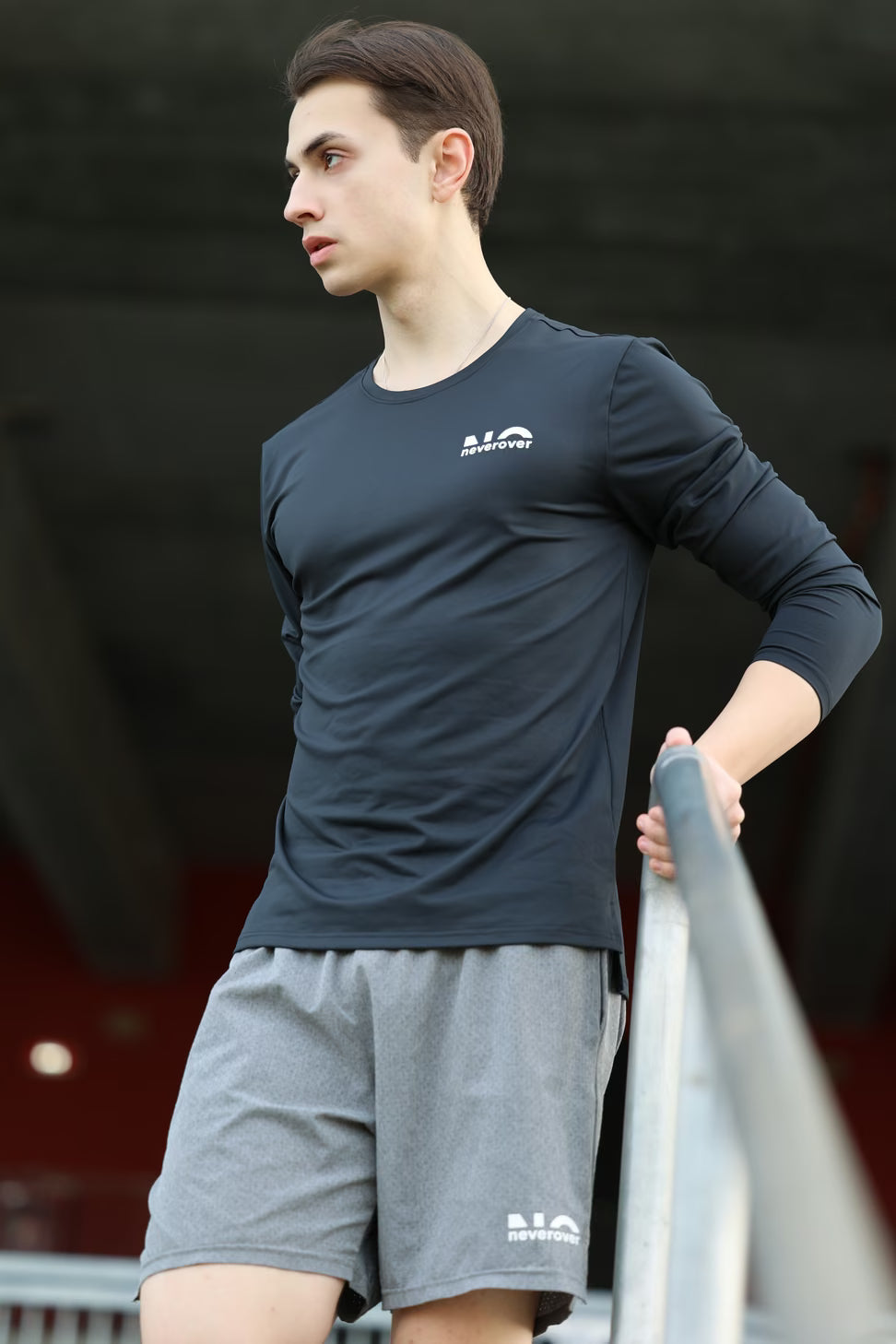 Neverover athlete in the black long sleeve and shorts